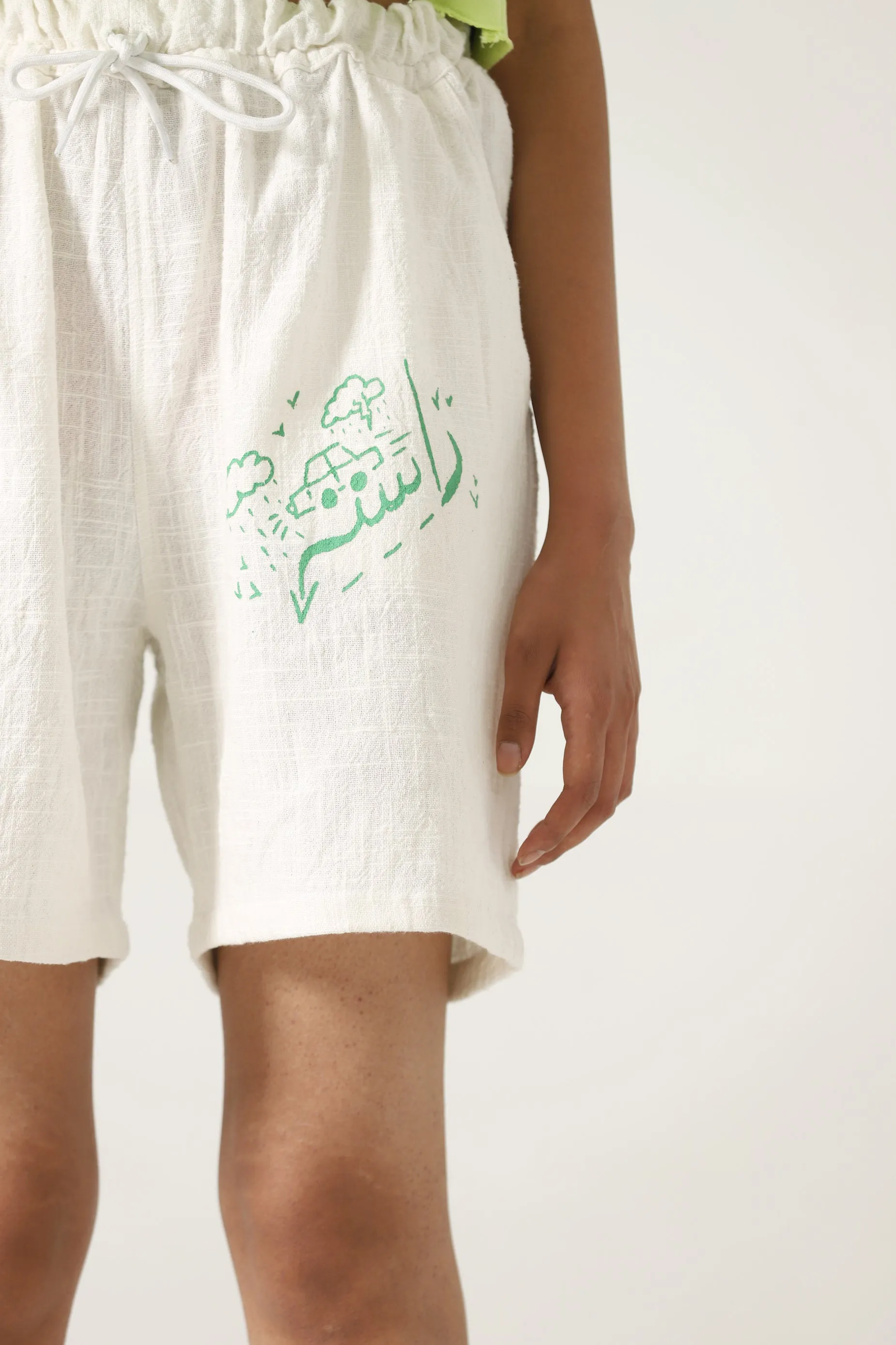 HAND WOVEN GREEN LOGO SHORTS